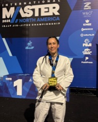 Giulia with her IBJJF North American Master medal