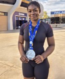 Nia Blackman with medals